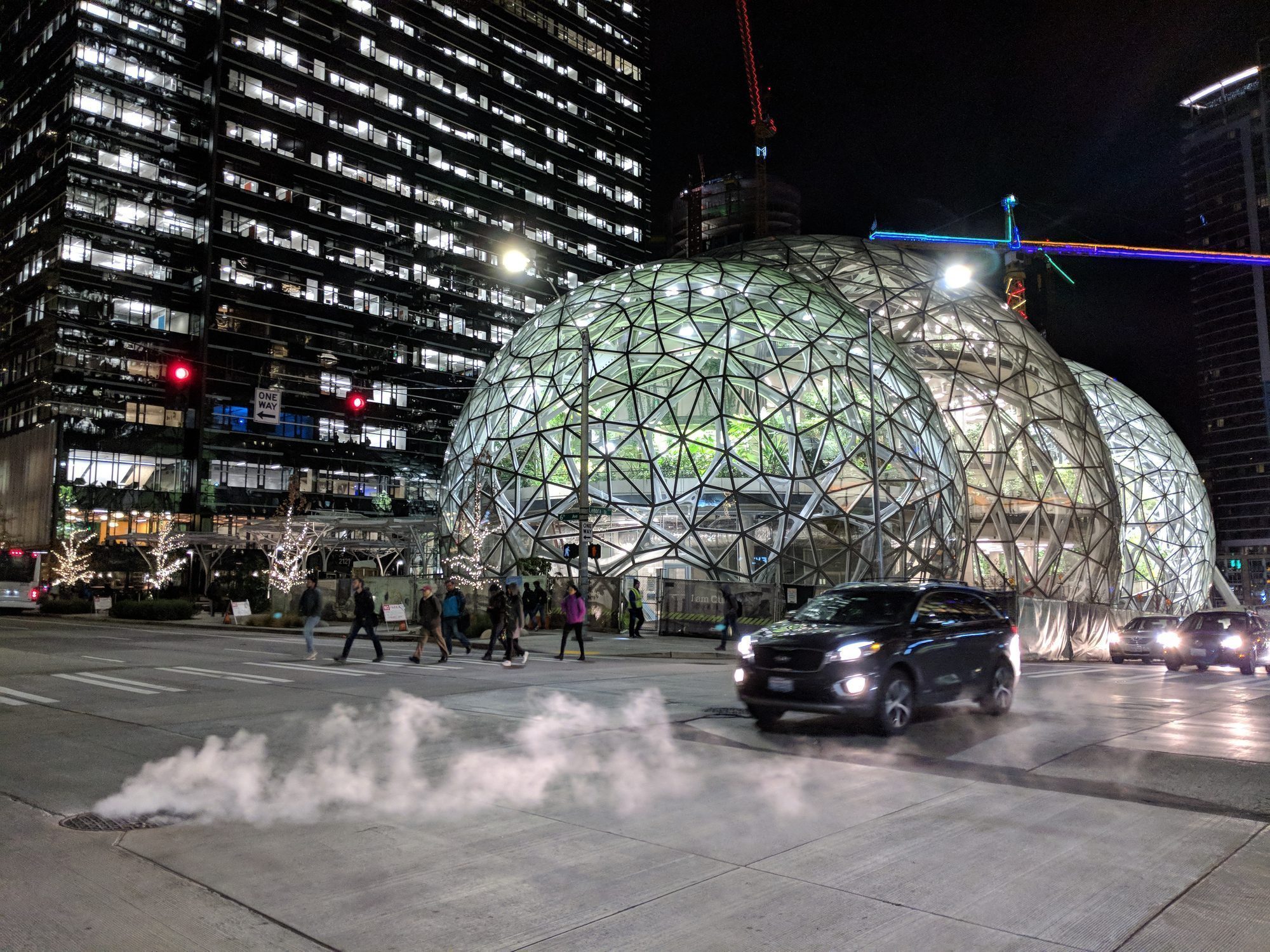Seattle, Washington USA - NOVEMBER 27, 2017: Workers Leave the Offices Outside Amazon Headquarters and Biosphere Domes