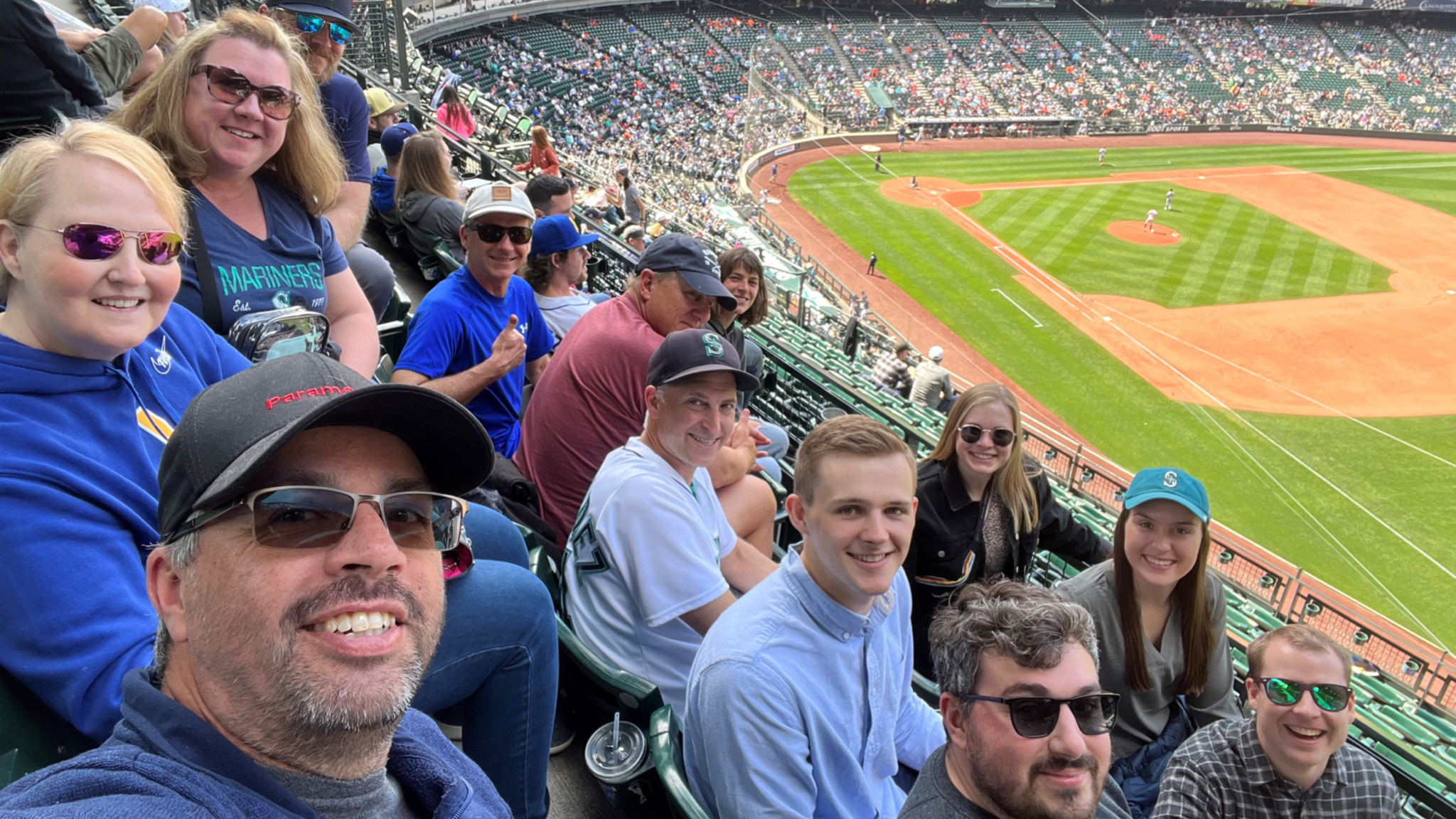 Parametrix employees, shown here at a Mariners game at T-Mobile Park, say they're driven by the company's mission.